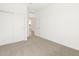 Spacious bedroom with sliding closet doors and neutral carpeting at 3390 E Audrey Dr, San Tan Valley, AZ 85143