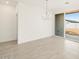 A spacious dining room with a sliding glass door that allows a lot of light at 3390 E Audrey Dr, San Tan Valley, AZ 85143