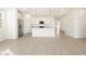 This open-concept kitchen features granite countertops, stainless steel appliances and island seating at 3390 E Audrey Dr, San Tan Valley, AZ 85143