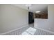 Spacious dining area with patterned tile floor and kitchen view at 36224 W Picasso St, Maricopa, AZ 85138