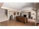 Basement living space featuring a wet bar and comfortable lounge area with direct access to the upper floors at 15155 E Westridge Dr, Fountain Hills, AZ 85268