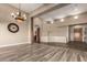 Large living room with wood beam accent, chandelier, and access to other areas of the home at 15155 E Westridge Dr, Fountain Hills, AZ 85268