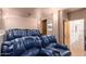 Home theater room featuring comfortable seating with reclining seats and movie poster at 15155 E Westridge Dr, Fountain Hills, AZ 85268