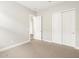 Bedroom with carpet and closet with sliding doors at 17666 W Pierson St, Goodyear, AZ 85395