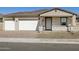 Charming single-story home with a two-car garage and desert landscaping at 17666 W Pierson St, Goodyear, AZ 85395