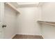 Large walk-in closet with double hanging rods at 18609 N Kiva Dr, Sun City, AZ 85373