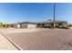 Ranch-style home with a two-car garage at 18609 N Kiva Dr, Sun City, AZ 85373