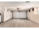 Spacious two-car garage with built-in cabinets at 18609 N Kiva Dr, Sun City, AZ 85373