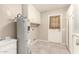 Laundry room with washer, dryer hookups, and cabinets at 18609 N Kiva Dr, Sun City, AZ 85373