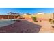 Backyard with gravel, small plants, and a pergola at 22538 W Mohave St, Buckeye, AZ 85326