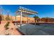 Covered patio area with pergola in backyard at 22538 W Mohave St, Buckeye, AZ 85326