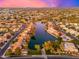 Aerial view of lakefront homes in a residential community at 2257 W Periwinkle Way, Chandler, AZ 85248