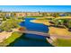 Aerial view of a peaceful golf course with bridge at 2257 W Periwinkle Way, Chandler, AZ 85248