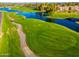 Golf course community with scenic waterways and lush green fairways at 2257 W Periwinkle Way, Chandler, AZ 85248