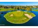 Aerial view of golf course with water features and golfers at 2257 W Periwinkle Way, Chandler, AZ 85248