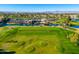 Aerial view of a scenic golf course and community at 2257 W Periwinkle Way, Chandler, AZ 85248