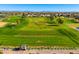 Golf course driving range with multiple stations at 2257 W Periwinkle Way, Chandler, AZ 85248