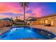 Relaxing kidney-shaped pool with patio and lounge area; sunset view at 2257 W Periwinkle Way, Chandler, AZ 85248