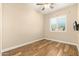 Bright bedroom with wood floors and window shutters at 2257 W Periwinkle Way, Chandler, AZ 85248