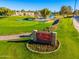 Attractive entrance to the community with a welcoming sign and landscaping at 2257 W Periwinkle Way, Chandler, AZ 85248