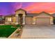 Two-story home with a three-car garage and manicured lawn at 2257 W Periwinkle Way, Chandler, AZ 85248