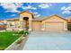 House exterior featuring a two-car garage and well-manicured lawn at 2257 W Periwinkle Way, Chandler, AZ 85248