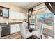 Kitchen with breakfast area and sliding glass doors to backyard at 2257 W Periwinkle Way, Chandler, AZ 85248