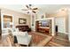 Living Room with leather sofas and built in entertainment center at 2257 W Periwinkle Way, Chandler, AZ 85248