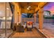 Relaxing covered patio with seating and ceiling fan at 2257 W Periwinkle Way, Chandler, AZ 85248