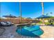 Inviting kidney-shaped pool with patio and lounge chairs at 2257 W Periwinkle Way, Chandler, AZ 85248