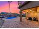 Luminous blue pool and relaxing patio with seating area at 2257 W Periwinkle Way, Chandler, AZ 85248