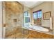 Spa-like bathroom with walk-in shower and soaking tub at 27440 N Alma School Pkwy # 101, Scottsdale, AZ 85262