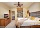 Guest bedroom with access to patio at 27440 N Alma School Pkwy # 101, Scottsdale, AZ 85262