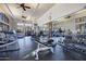 Well-equipped fitness center with treadmills, weights, and exercise bikes at 27440 N Alma School Pkwy # 101, Scottsdale, AZ 85262