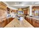 Large kitchen boasts granite countertops, stainless steel appliances, and custom cabinetry at 27440 N Alma School Pkwy # 101, Scottsdale, AZ 85262