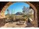 Landscaped courtyard with desert plants and mountain view at 27440 N Alma School Pkwy # 101, Scottsdale, AZ 85262