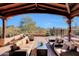 Covered patio with seating area and mountain views at 27440 N Alma School Pkwy # 101, Scottsdale, AZ 85262