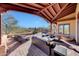 Spacious patio with seating, fire pit, and mountain views at 27440 N Alma School Pkwy # 101, Scottsdale, AZ 85262