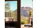 Stunning mountain views from the home's window at 27440 N Alma School Pkwy # 101, Scottsdale, AZ 85262