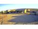 Aerial view of a single-story house with a large backyard and desert landscape at 30418 W Pierce St, Buckeye, AZ 85396