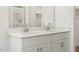 Bathroom featuring a double sink vanity, white countertops, and modern fixtures at 37028 W Prado St, Maricopa, AZ 85138