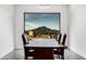 Elegant dining room with a live-edge wood table and mountain views at 40564 N 50Th St, Cave Creek, AZ 85331