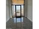 Bright entryway with modern flooring and glass doors at 40564 N 50Th St, Cave Creek, AZ 85331