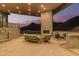 Evening view of patio with seating and mountain backdrop at 40564 N 50Th St, Cave Creek, AZ 85331