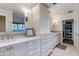 Elegant bathroom with double vanity, walk-in closet, and ample storage at 6030 E Calle Del Sud St, Scottsdale, AZ 85251