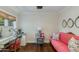 Serene bedroom with a pink couch and vanity area at 6030 E Calle Del Sud St, Scottsdale, AZ 85251