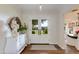 Inviting entryway with double doors and a whitewashed dresser at 6030 E Calle Del Sud St, Scottsdale, AZ 85251