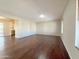 Bright living room featuring hardwood floors and large windows at 9457 W Newport Dr, Sun City, AZ 85351