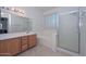 Clean bathroom with a large vanity and shower at 10350 W Alvarado Rd, Avondale, AZ 85392