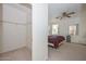 Bedroom with a large closet and ensuite access at 10350 W Alvarado Rd, Avondale, AZ 85392